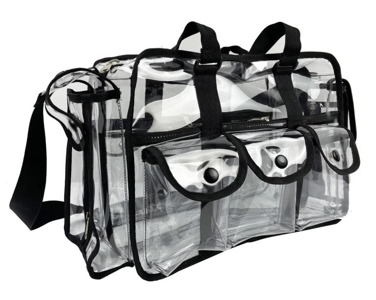 Clear PVC makeup organizer bag with zipper closure, shoulder strap and multiple front pockets for wholesale cosmetic storage orders Clear PVC makeup organizer bag with zipper closure, shoulder strap and multiple front pockets for wholesale cosmetic storage orders