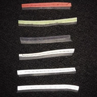 Tubs reflectants de teixit de plata